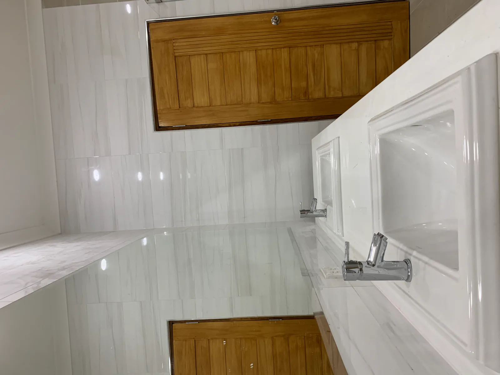 Bathroom renovation — finish detail and tile-setting